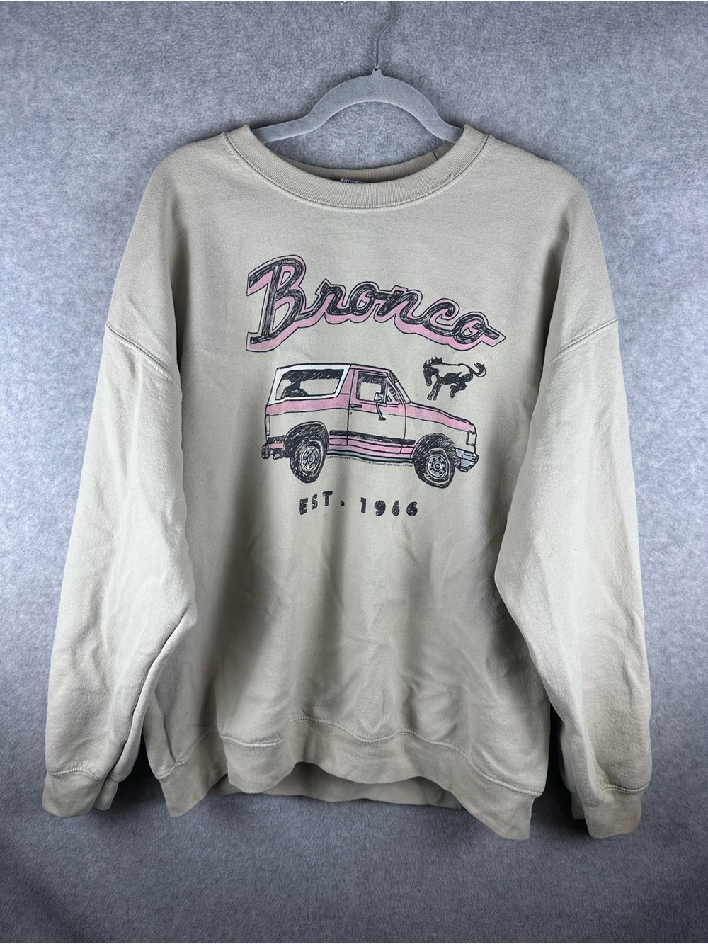 Junk Food Clothing Beige Bronco Graphic Sweatshirt with Pink Accents